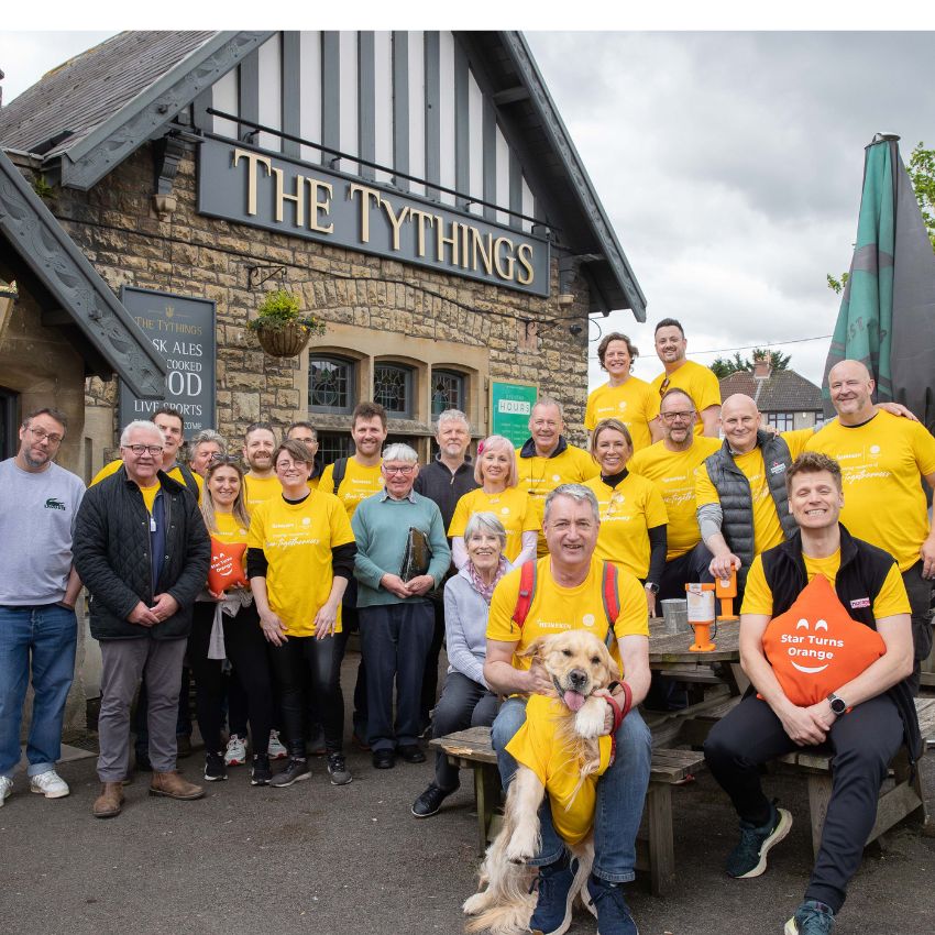 2024 colleagues outside a Star Pub wearing Marmalade Trust Tshirts.