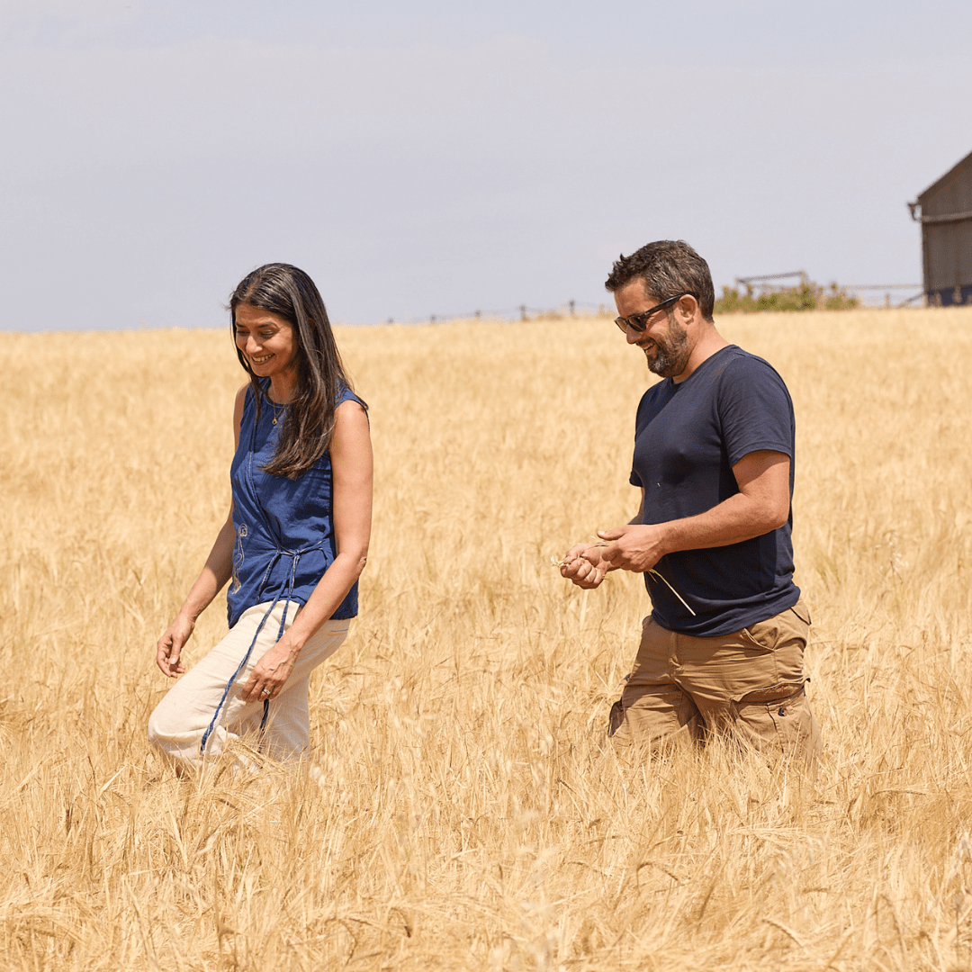 Regenerative Agriculture - two people walking through the barley farm