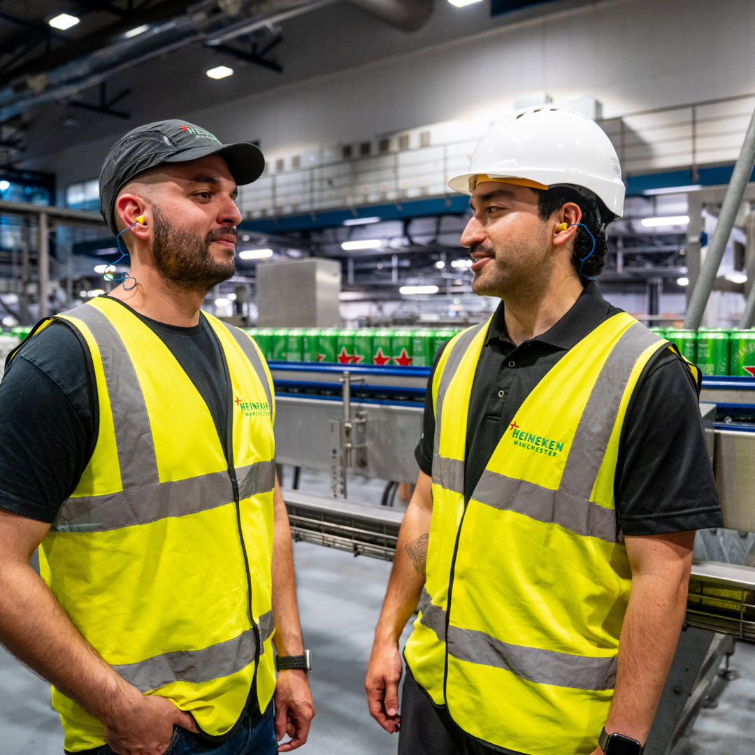 Two colleagues in the brewery speaking